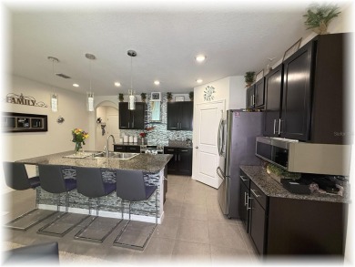 SE - DIRECTLY ON THE GOLF COURSE - WITH LOTS OF SMART HOME on Lake Diamond Golf and Country Club in Florida - for sale on GolfHomes.com, golf home, golf lot