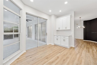 Welcome to your dream home at 9402 Woodbay Drive, where modern on Westchase Golf Club in Florida - for sale on GolfHomes.com, golf home, golf lot