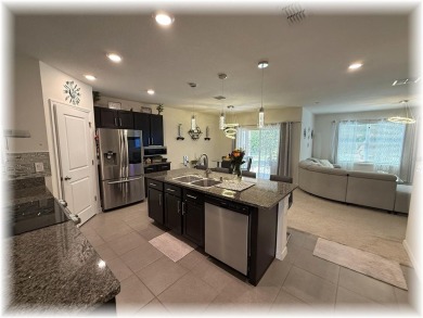 SE - DIRECTLY ON THE GOLF COURSE - WITH LOTS OF SMART HOME on Lake Diamond Golf and Country Club in Florida - for sale on GolfHomes.com, golf home, golf lot