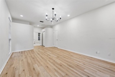 Welcome to your dream home at 9402 Woodbay Drive, where modern on Westchase Golf Club in Florida - for sale on GolfHomes.com, golf home, golf lot