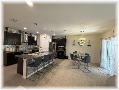 SE - DIRECTLY ON THE GOLF COURSE - WITH LOTS OF SMART HOME on Lake Diamond Golf and Country Club in Florida - for sale on GolfHomes.com, golf home, golf lot