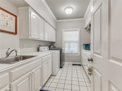 Welcome to 609 E Pensacola St--an updated 4,034 sq ft (CH) home on Indian Springs Country Club in Oklahoma - for sale on GolfHomes.com, golf home, golf lot