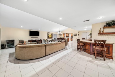 This premium water view residence offers 2,660 sq ft of living on Hunters Run Golf and Country Club in Florida - for sale on GolfHomes.com, golf home, golf lot