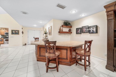 This premium water view residence offers 2,660 sq ft of living on Hunters Run Golf and Country Club in Florida - for sale on GolfHomes.com, golf home, golf lot
