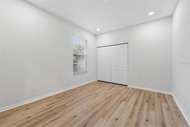 Welcome to your dream home at 9402 Woodbay Drive, where modern on Westchase Golf Club in Florida - for sale on GolfHomes.com, golf home, golf lot