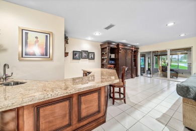 This premium water view residence offers 2,660 sq ft of living on Hunters Run Golf and Country Club in Florida - for sale on GolfHomes.com, golf home, golf lot