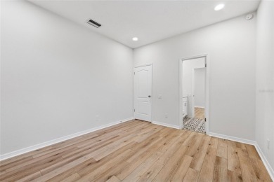 Welcome to your dream home at 9402 Woodbay Drive, where modern on Westchase Golf Club in Florida - for sale on GolfHomes.com, golf home, golf lot