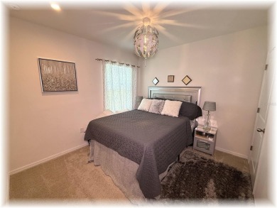 SE - DIRECTLY ON THE GOLF COURSE - WITH LOTS OF SMART HOME on Lake Diamond Golf and Country Club in Florida - for sale on GolfHomes.com, golf home, golf lot