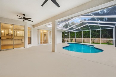 Welcome to your dream home at 9402 Woodbay Drive, where modern on Westchase Golf Club in Florida - for sale on GolfHomes.com, golf home, golf lot