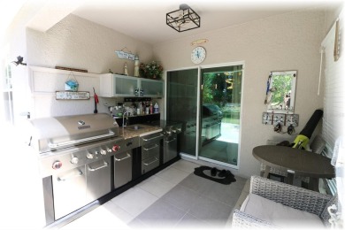 SE - DIRECTLY ON THE GOLF COURSE - WITH LOTS OF SMART HOME on Lake Diamond Golf and Country Club in Florida - for sale on GolfHomes.com, golf home, golf lot