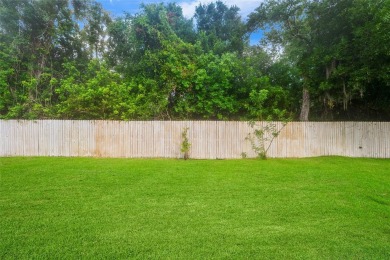 Welcome to your dream home at 9402 Woodbay Drive, where modern on Westchase Golf Club in Florida - for sale on GolfHomes.com, golf home, golf lot