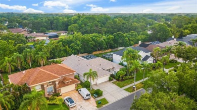 Welcome to your dream home at 9402 Woodbay Drive, where modern on Westchase Golf Club in Florida - for sale on GolfHomes.com, golf home, golf lot