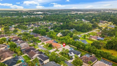 Welcome to your dream home at 9402 Woodbay Drive, where modern on Westchase Golf Club in Florida - for sale on GolfHomes.com, golf home, golf lot