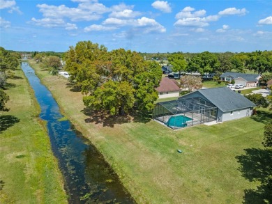 Welcome Home! You will LOVE this Beautiful 3/2 Pool HOME in on Wedgefield Golf Club in Florida - for sale on GolfHomes.com, golf home, golf lot