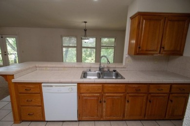 Endless potential and excellent opportunity to make this on Bella Vista Country Club - Berksdale in Arkansas - for sale on GolfHomes.com, golf home, golf lot