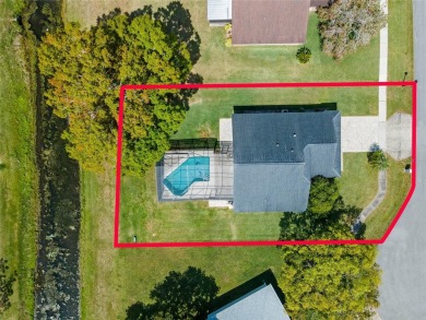 Welcome Home! You will LOVE this Beautiful 3/2 Pool HOME in on Wedgefield Golf Club in Florida - for sale on GolfHomes.com, golf home, golf lot