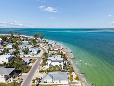 Fully updated, beach front stunner! Situated on the highly on Key Royale Club in Florida - for sale on GolfHomes.com, golf home, golf lot