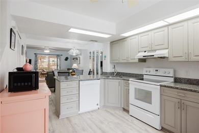 Enjoy peaceful lakefront views and effortless Florida living on Deep Creek Golf Club in Florida - for sale on GolfHomes.com, golf home, golf lot