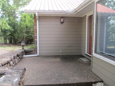 Upon entering this well maintained home you are immediately on Holiday Island Golf Course in Arkansas - for sale on GolfHomes.com, golf home, golf lot