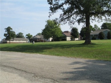 Upon entering this well maintained home you are immediately on Holiday Island Golf Course in Arkansas - for sale on GolfHomes.com, golf home, golf lot