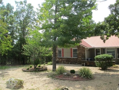 Upon entering this well maintained home you are immediately on Holiday Island Golf Course in Arkansas - for sale on GolfHomes.com, golf home, golf lot