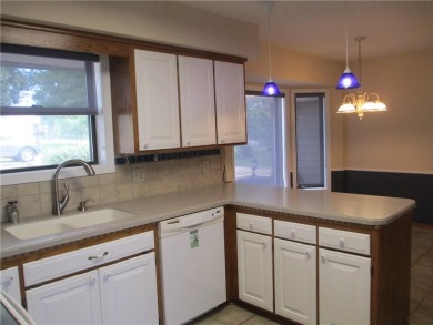 Upon entering this well maintained home you are immediately on Holiday Island Golf Course in Arkansas - for sale on GolfHomes.com, golf home, golf lot