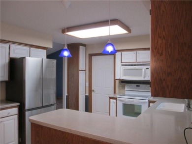Upon entering this well maintained home you are immediately on Holiday Island Golf Course in Arkansas - for sale on GolfHomes.com, golf home, golf lot