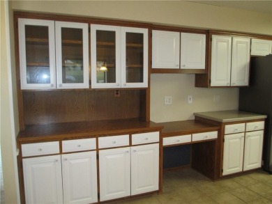 Upon entering this well maintained home you are immediately on Holiday Island Golf Course in Arkansas - for sale on GolfHomes.com, golf home, golf lot