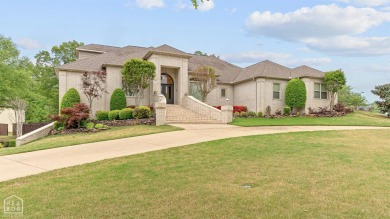 Welcome to the epitome of luxury living in the prestigious on RidgePointe Country Club in Arkansas - for sale on GolfHomes.com, golf home, golf lot