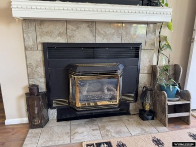 Welcome to this extensively renovated one-level 3-bedroom on Riverton Country Club in Wyoming - for sale on GolfHomes.com, golf home, golf lot