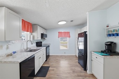 MOVE-IN READY, FULLY FURNISHED and packed with updates in the on Polo Park Golf Course in Florida - for sale on GolfHomes.com, golf home, golf lot