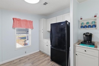 MOVE-IN READY, FULLY FURNISHED and packed with updates in the on Polo Park Golf Course in Florida - for sale on GolfHomes.com, golf home, golf lot