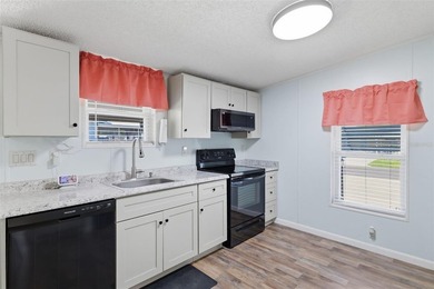 MOVE-IN READY, FULLY FURNISHED and packed with updates in the on Polo Park Golf Course in Florida - for sale on GolfHomes.com, golf home, golf lot