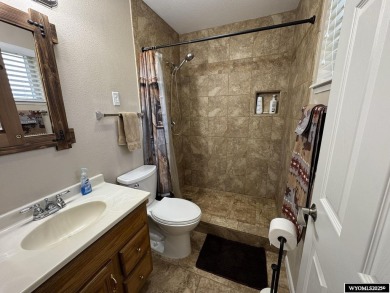 Welcome to this extensively renovated one-level 3-bedroom on Riverton Country Club in Wyoming - for sale on GolfHomes.com, golf home, golf lot