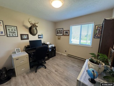 Welcome to this extensively renovated one-level 3-bedroom on Riverton Country Club in Wyoming - for sale on GolfHomes.com, golf home, golf lot