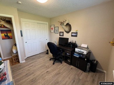 Welcome to this extensively renovated one-level 3-bedroom on Riverton Country Club in Wyoming - for sale on GolfHomes.com, golf home, golf lot