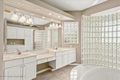 Located in Baytree, Florida, this 3,275-square-foot home sits on on Baytree National Golf Links in Florida - for sale on GolfHomes.com, golf home, golf lot