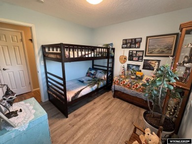 Welcome to this extensively renovated one-level 3-bedroom on Riverton Country Club in Wyoming - for sale on GolfHomes.com, golf home, golf lot