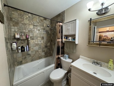 Welcome to this extensively renovated one-level 3-bedroom on Riverton Country Club in Wyoming - for sale on GolfHomes.com, golf home, golf lot