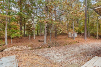 Enjoy a taste of serenity and elegance in this charming on Umstead Pines Golf and Swim At Willowhaven in North Carolina - for sale on GolfHomes.com, golf home, golf lot