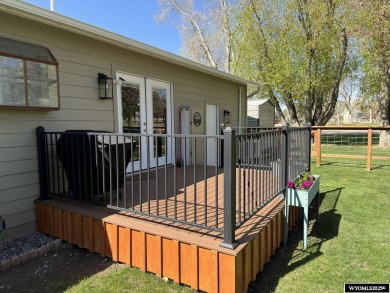 Welcome to this extensively renovated one-level 3-bedroom on Riverton Country Club in Wyoming - for sale on GolfHomes.com, golf home, golf lot