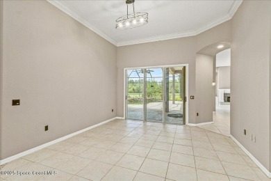 Located in Baytree, Florida, this 3,275-square-foot home sits on on Baytree National Golf Links in Florida - for sale on GolfHomes.com, golf home, golf lot