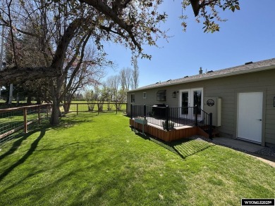 Welcome to this extensively renovated one-level 3-bedroom on Riverton Country Club in Wyoming - for sale on GolfHomes.com, golf home, golf lot