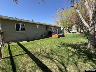 Welcome to this extensively renovated one-level 3-bedroom on Riverton Country Club in Wyoming - for sale on GolfHomes.com, golf home, golf lot