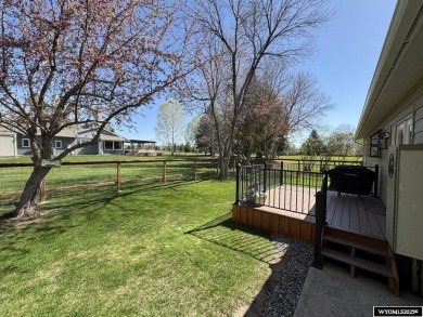 Welcome to this extensively renovated one-level 3-bedroom on Riverton Country Club in Wyoming - for sale on GolfHomes.com, golf home, golf lot