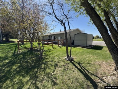 Welcome to this extensively renovated one-level 3-bedroom on Riverton Country Club in Wyoming - for sale on GolfHomes.com, golf home, golf lot