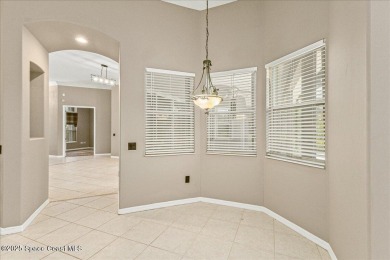 Located in Baytree, Florida, this 3,275-square-foot home sits on on Baytree National Golf Links in Florida - for sale on GolfHomes.com, golf home, golf lot