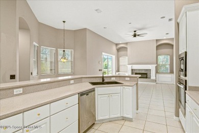 Located in Baytree, Florida, this 3,275-square-foot home sits on on Baytree National Golf Links in Florida - for sale on GolfHomes.com, golf home, golf lot