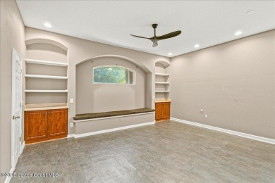 Located in Baytree, Florida, this 3,275-square-foot home sits on on Baytree National Golf Links in Florida - for sale on GolfHomes.com, golf home, golf lot