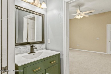 Located in Baytree, Florida, this 3,275-square-foot home sits on on Baytree National Golf Links in Florida - for sale on GolfHomes.com, golf home, golf lot